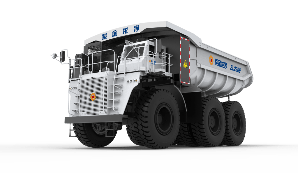 A large, heavy-duty dump truck with a white and gray exterior, showcasing its front view with massive tires and a flatbed designed for carrying loads.