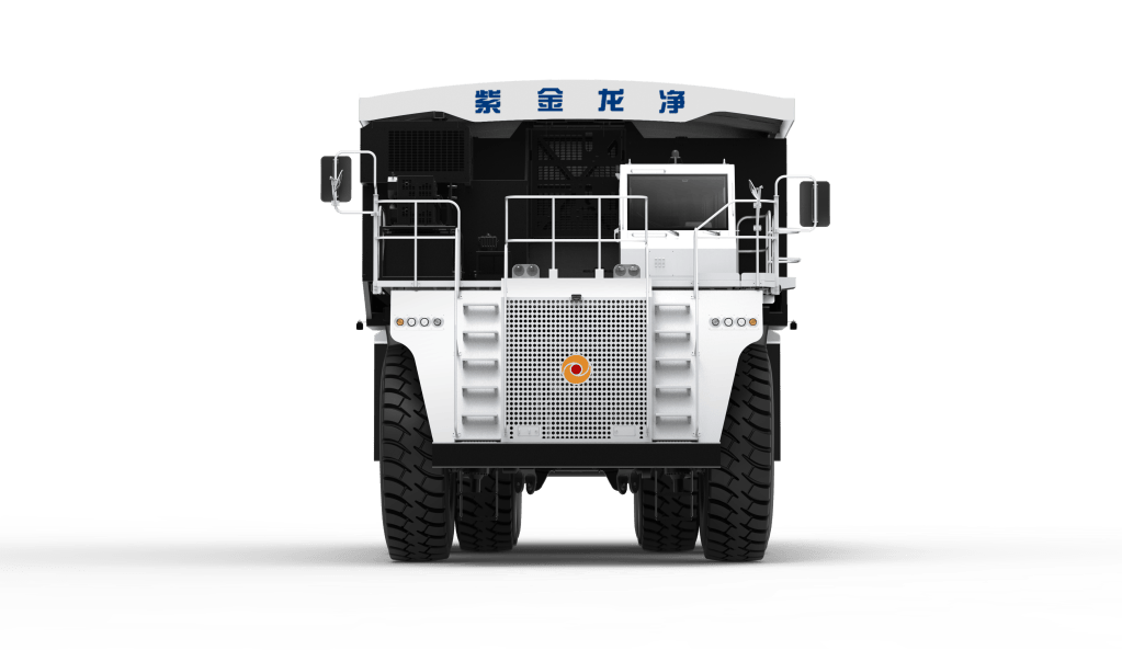Front view of a large mining truck with prominent wheels and a white upper section featuring Chinese characters.